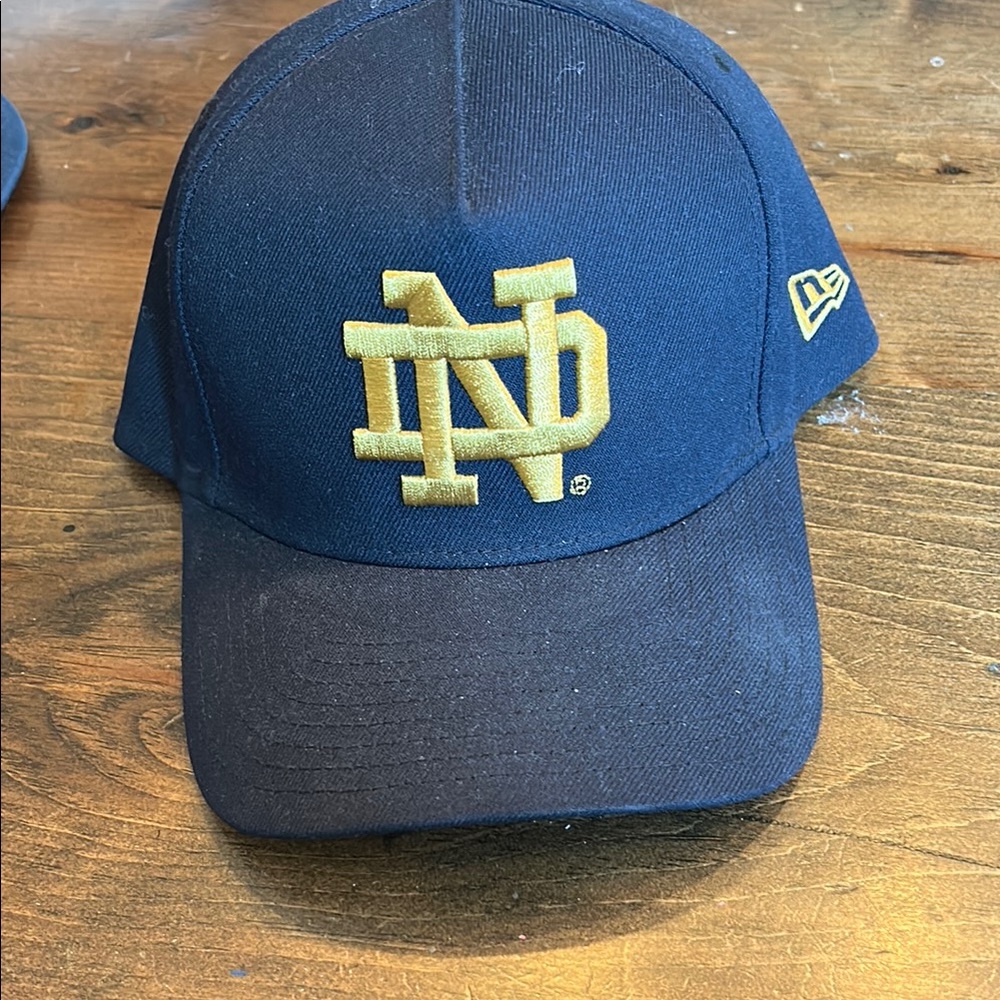 New Era Dark Blue and Gold 9FORTY Cap like new. A frame